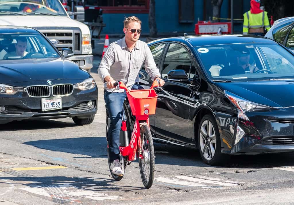 Man riding an e-bike on the street